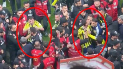 Galatasaray'ın 2-1 kazandığı derbinin ardından saha karışırken, Fenerbahçeli Mert Hakan